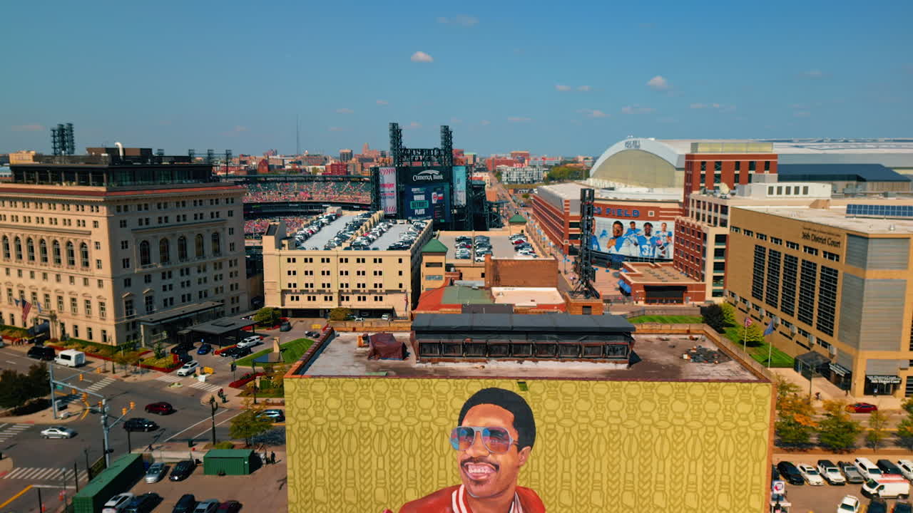 Stevie Wonder mural on the building of Detroit, Michigan, USA. Numerous cars are parked around. Aerial view. Detroit, USA, 28 July 2025: