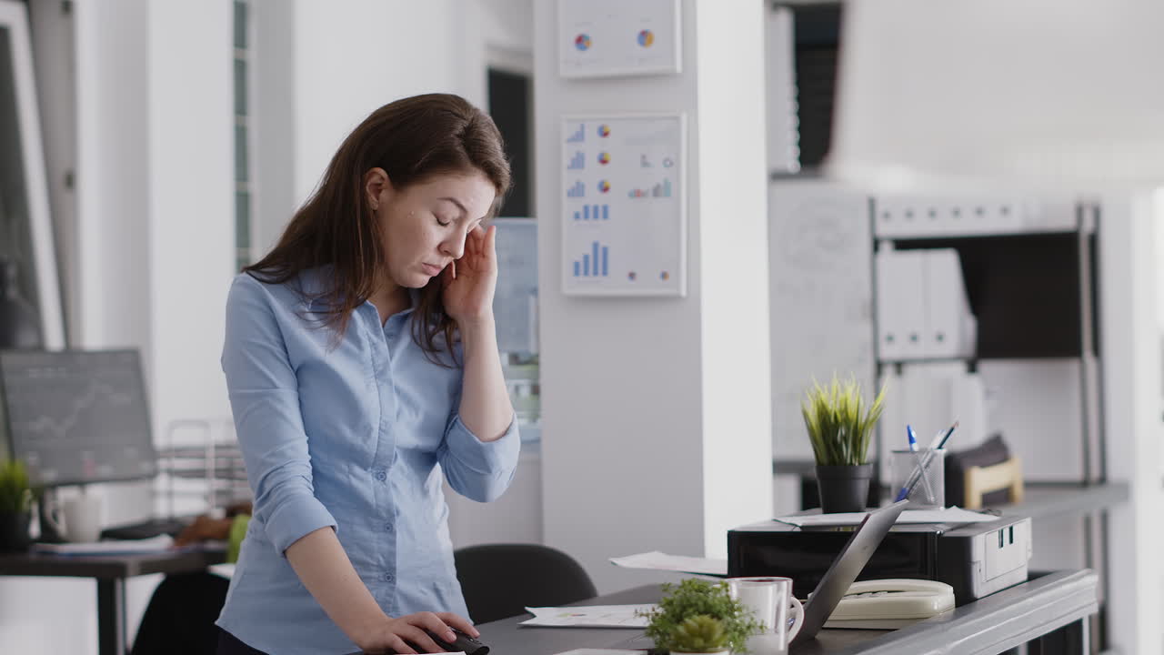 Businesswoman working at desk in office