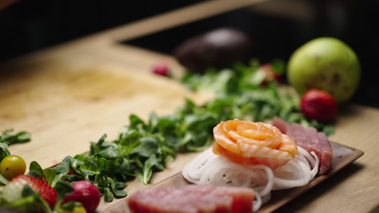 Chef Preparing Fresh Sashimi and Ingredients