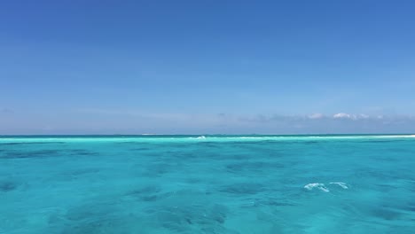 POV-sail-on-turquoise-caribbean-sea-waves-ans-splash-texture-sea-water