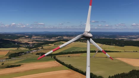 wind turbines overlooking the eifel region, hills, clean energy from the wind. Aerial video