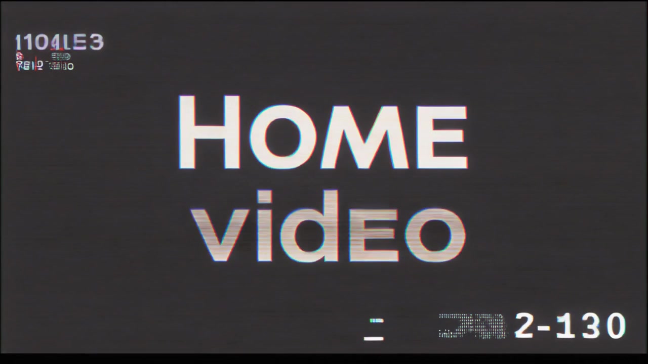 Vintage Home Video Title Card with VHS Glitch Effects
