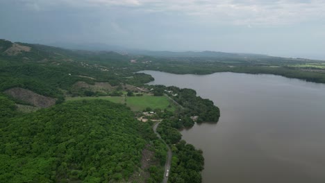 Aerial-view-of-Manialtepec-lagoon-and-its-coastal-mountains-near-Puerto-Escondido,-Oaxaca,-Mexico