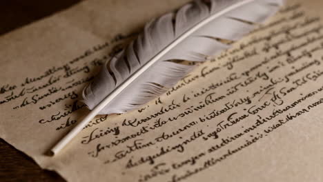 antique handwritten letter with quill