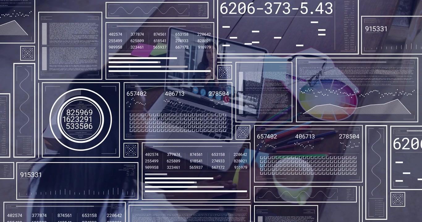 Woman designer typing on laptop checking phone and wheel, causing HUD overlaying updating charts