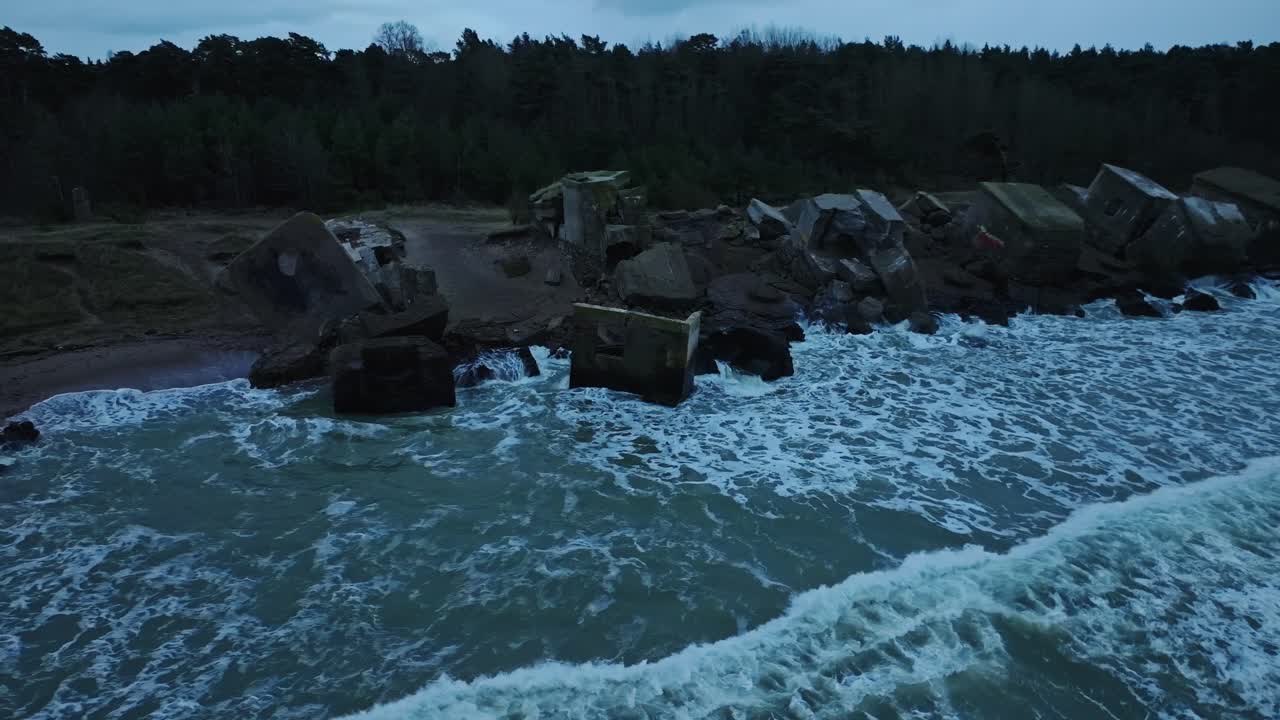 Historic ruins of Northern Fort collapsing into Baltic Sea waves near Liepaja
