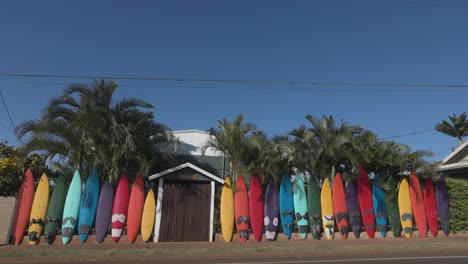 colorful surfboard fence decor