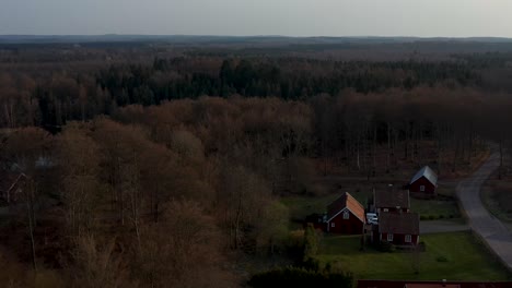 Drone-footage-of-birds-flying-over-lake-in-Sweden,-Västersjön-outside-Ängelholm,-Skåne