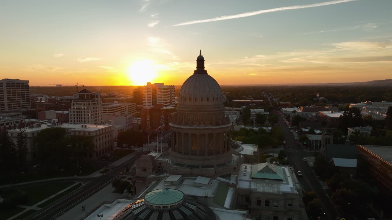 Idaho State Capitol Dome with beautiful glowing orange sunlight. Power and peace concept