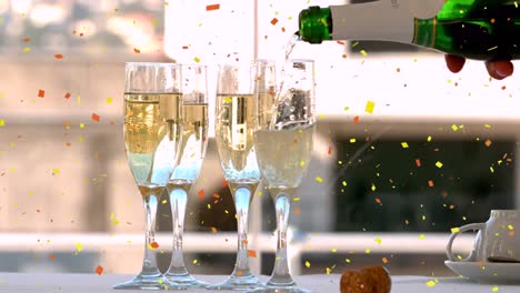 Animation-of-confetti-falling-and-bottle-being-poured-into-four-glasses-of-champagne
