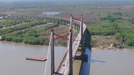 aerial view of a cable-stayed bridge over a river