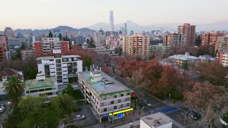 Aerial-dolly-overhead-the-Providencia-district-with-the-financial-district-behind