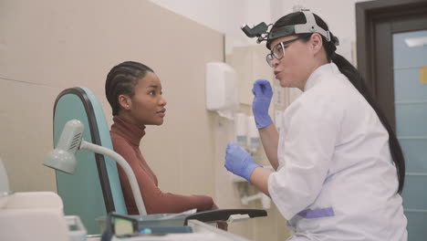 female doctor providing medical advice to a patient young girl