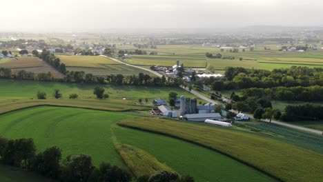 Beautiful-aerial-shot-of-rolling-hills-and-farmland-in-Narvon,-Lancaster-County-Pennsylvania,-USA-during-summer