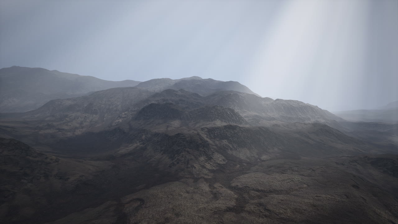 Sun Rays against the Backdrop of the Mountains