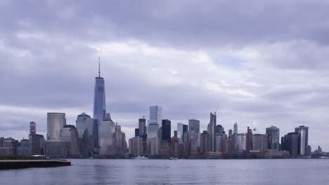 timelapse skyline new york on a cloudy day, metropolis cityscape, ships movement