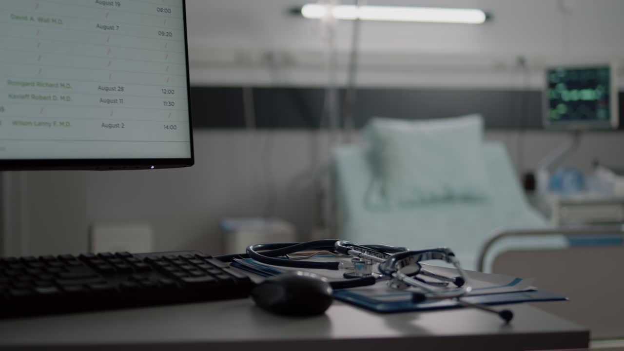 Close up of desk with computer and medical tools