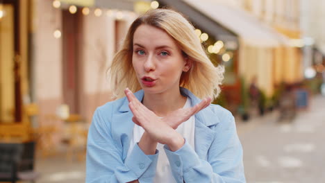 Woman-lady-presses-index-finger-to-lips-makes-silence-hush-gesture-sign-do-not-tells-gossip-secret