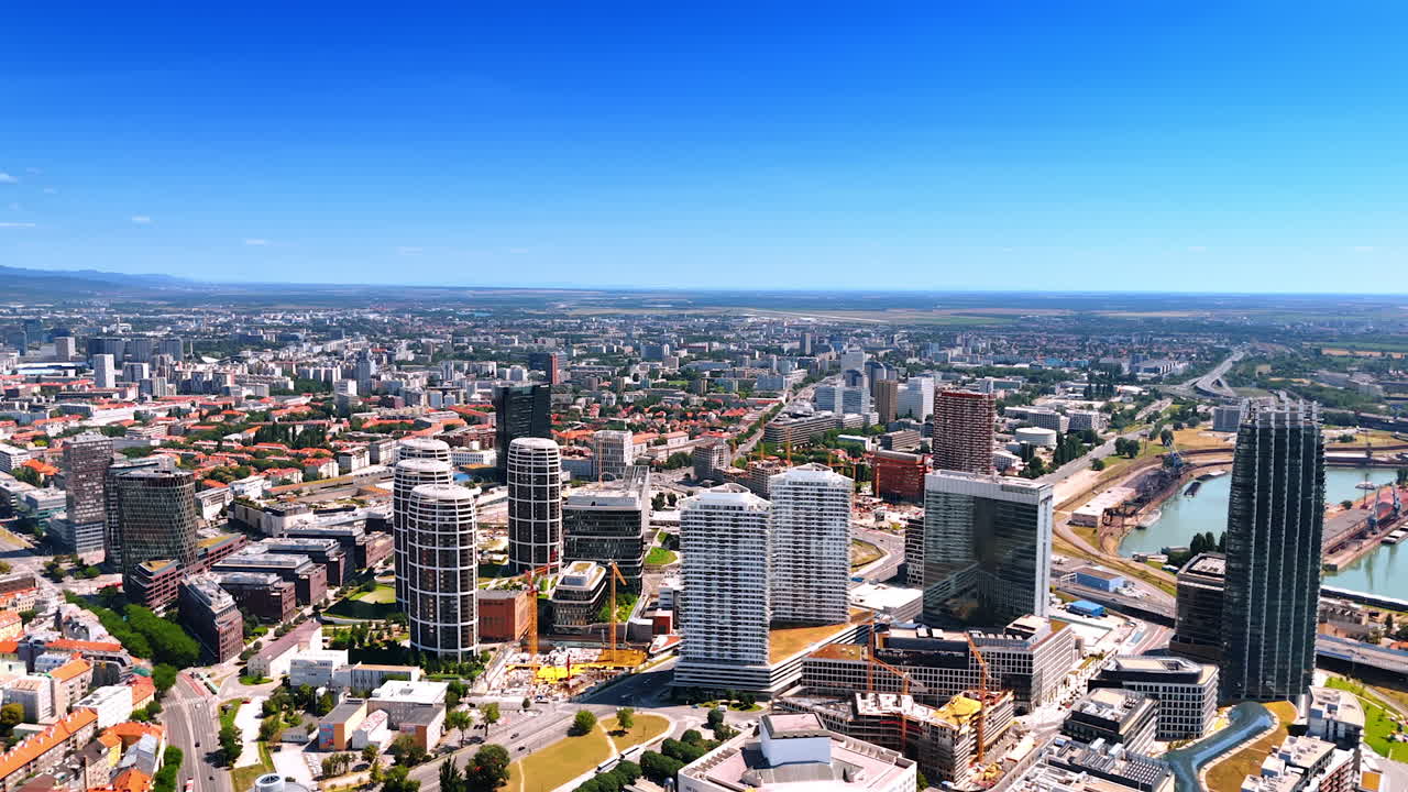 Sunny panorama of modern part of Bratislava, Slovakia. Beautiful modern high-rises in the city view
