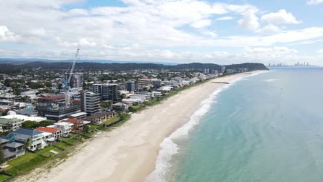 Houses-And-Apartment-Buildings-By-The-White-Sand-Beach-In-Summer