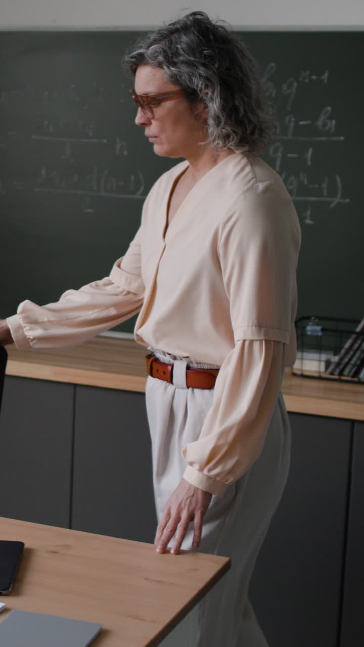 Teacher working in classroom