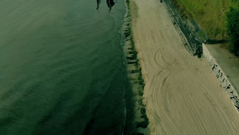 Aerial-fotage-on-empty-beach-early-morning