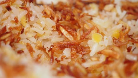 close-up of rice with crispy fried onions