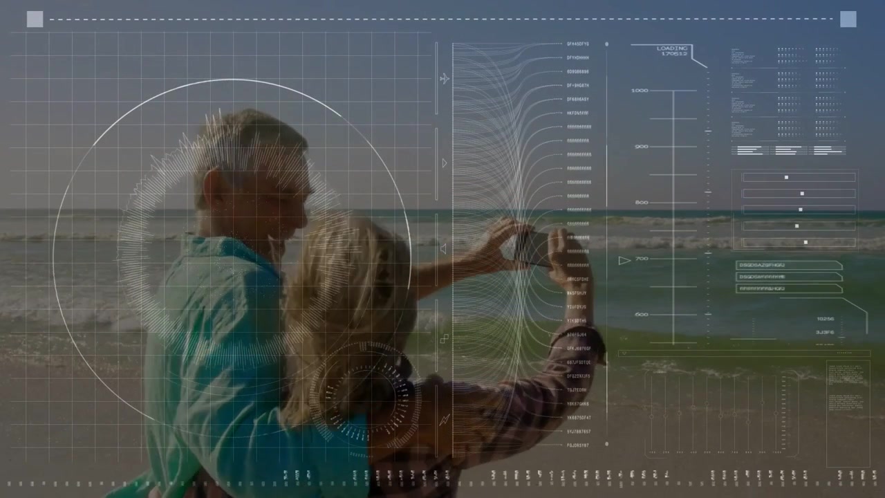 Raising senior woman leveling phone at beach, partner in teal shirt holding her, framing with HUD