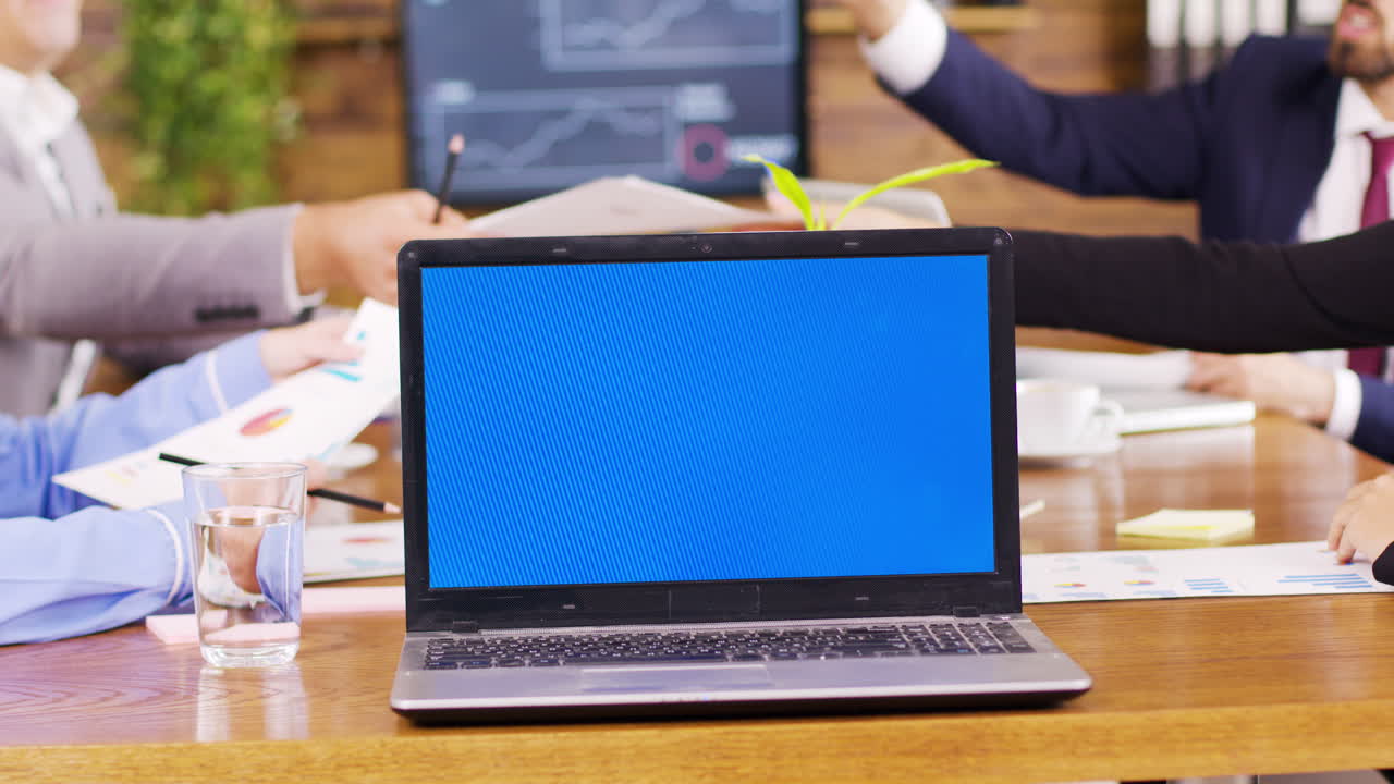 In the conference room laptop with blue screen