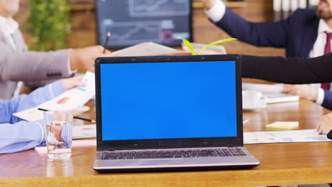 in the conference room laptop with blue screen