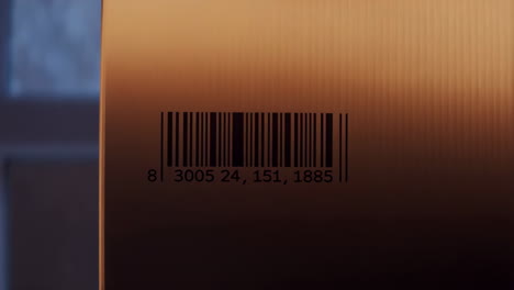 close-up of a barcode on a golden, textured surface