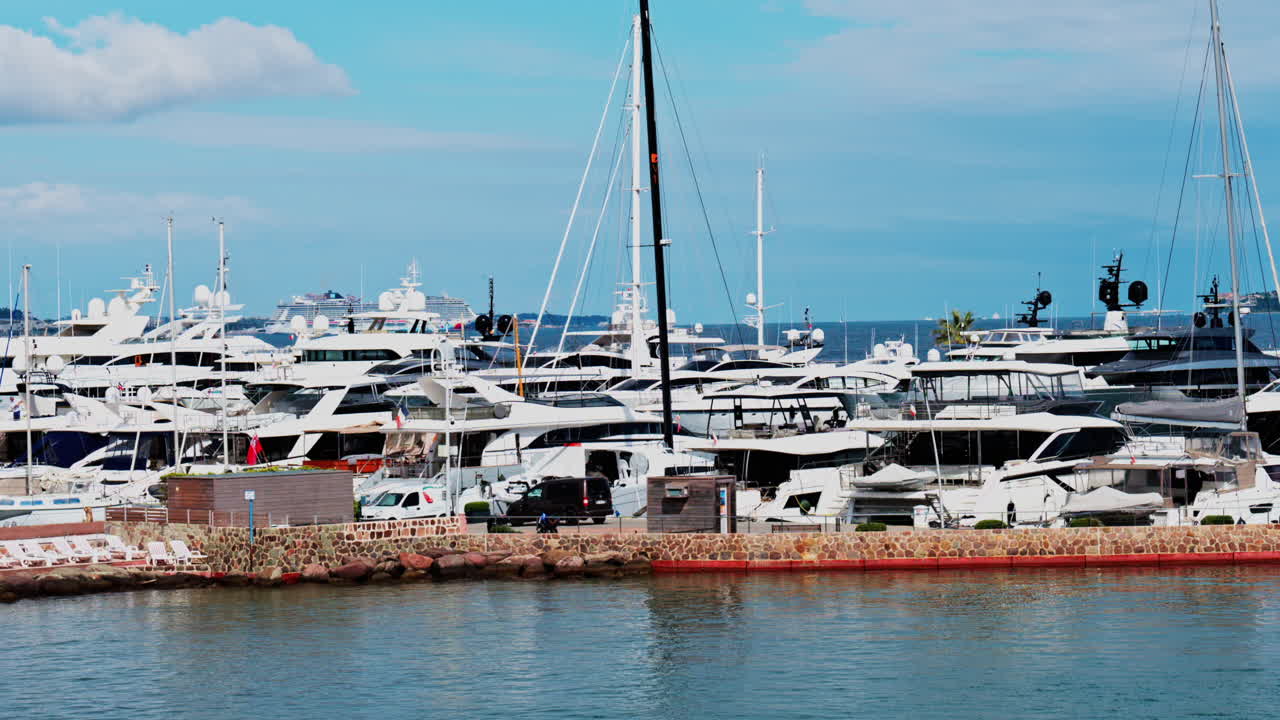 Multiple boats docked in the Mandelieu-La Napoule Port in France in daylight