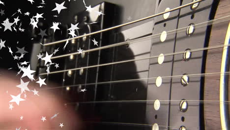 electric guitar being played in flat design, showing fingers plucking strings under star overlay