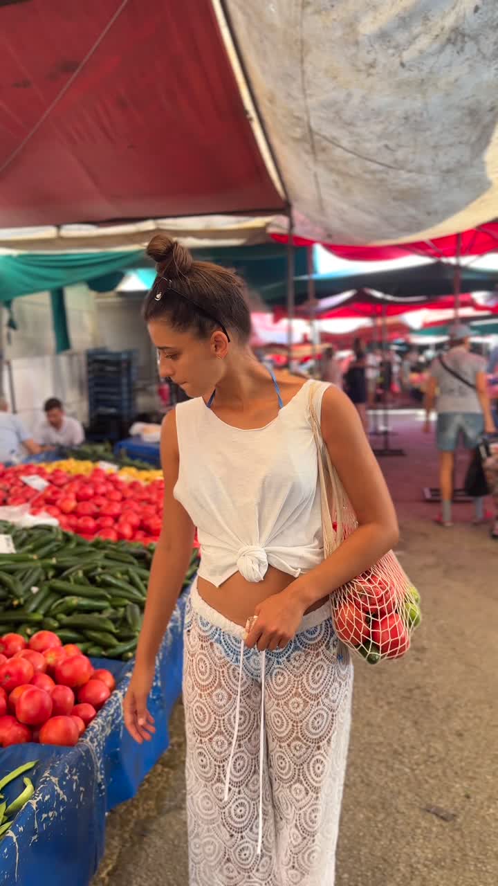 Woman Shopping at a Vibrant Outdoor Market