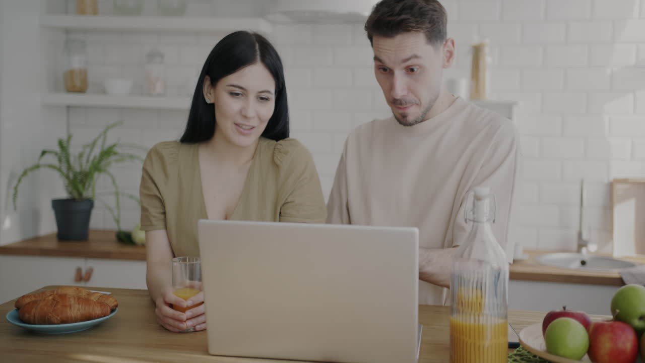 Couple Working From Home, Enjoying Breakfast