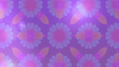 Digital-animation-of-kaleidoscopic-pattern-moving-against-copy-space-on-pink-gradient-background