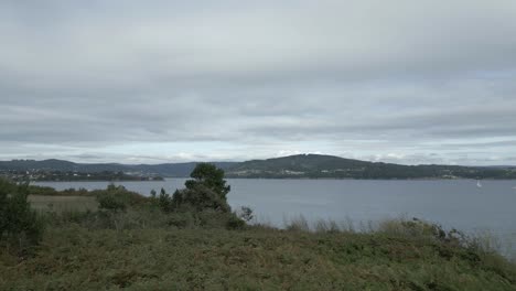 Drone-view-of-coast-in-Ría-de-Betanzos,-Galicia,-Spain