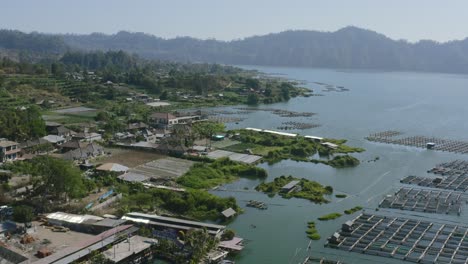 aerial of a seaweed farm in batur lake around bali indonesia during day