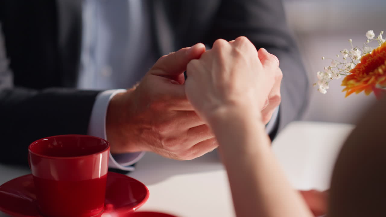 Romantic boyfriend talking lady flirting in cozy restaurant smiling closeup