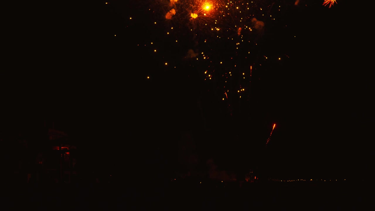 Golden Fireworks Display Exploding in the Night Sky