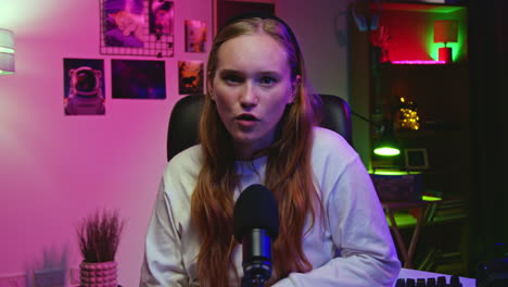 young woman streamer recording a video