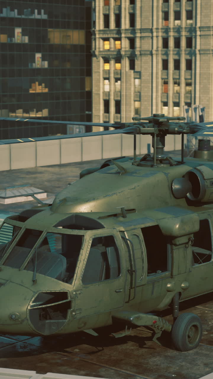 Glowing city lightsa military helicopter is stationed on a tall buildings rooftop