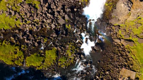 Aerial-view-of-Öxarárfoss-Waterfall-presents-captivating-display-of-picturesque-landscape-of-Iceland's-Thingvellir-National-Park