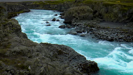 slow motion footage of skjalfandafljot river and its waterfalls near akureyri in iceland