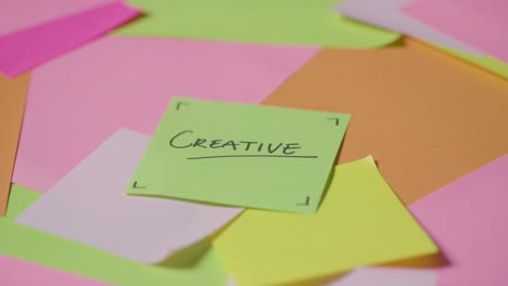 business concept of revolving sticky notes with creative written on top note 1