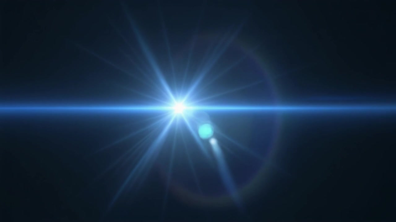 Bagliore blu brillante dell'obiettivo che si muove su sfondo scuro