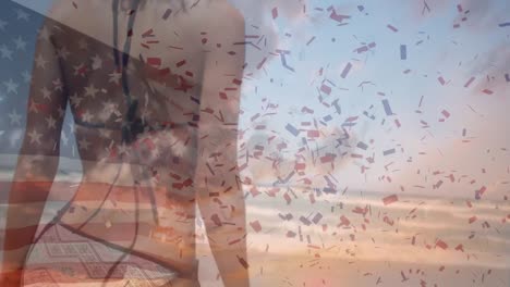 Animation-of-american-flag-and-confetti-over-caucasian-woman-at-beach