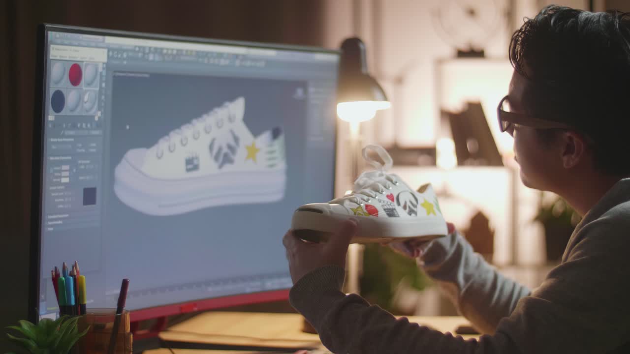 Designer Examining Custom Sneaker Design