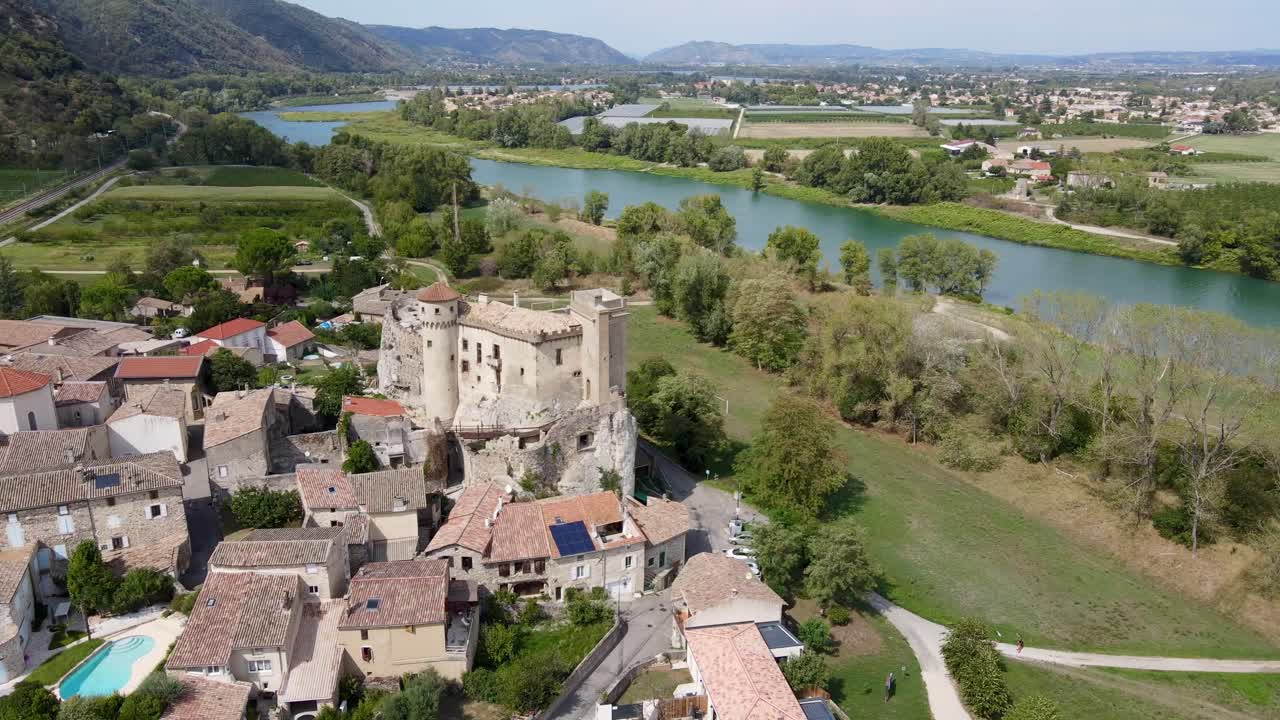 Drone circle around a castle in an old village in Ard&egrave;che, France