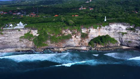 amazing cliffs of uluwatu in bali, indonesia - aerial shot